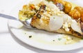 Roasted codfish with potatoes or Bacalhau a Bras