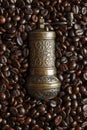 Roasted coffee beans background texture hand coffee mill Royalty Free Stock Photo