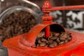 Roasted coffee beans being grinded in traditional style Royalty Free Stock Photo