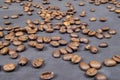 Coffee on black surface Roasted beans of Arabica Robusta Low depth of field Royalty Free Stock Photo