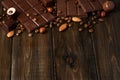 Roasted coffee beans with black chocolate close up Royalty Free Stock Photo