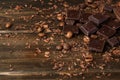 Roasted coffee beans with black chocolate close up Royalty Free Stock Photo