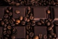 Roasted coffee beans and chocolate bar close-up Royalty Free Stock Photo