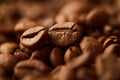 Roasted coffee beans close up. Espresso dark, aroma, black caffeine drink.