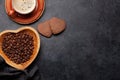 Roasted coffee beans, cup and gingerbread cookies Royalty Free Stock Photo