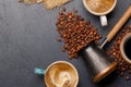 Roasted coffee beans and espresso coffee cup Royalty Free Stock Photo