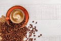 Roasted coffee beans and espresso coffee cup Royalty Free Stock Photo