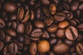 Roasted coffee beans full frame background Close up macro dark brown Royalty Free Stock Photo