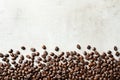 Roasted coffee beans on grey background with space Royalty Free Stock Photo