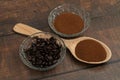 Roasted coffee beans, ground coffee, Cup of coffee, Wooden spoon with roasted coffee Royalty Free Stock Photo