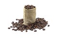Roasted coffee beans and hemp bag. isolated on a white background. Royalty Free Stock Photo