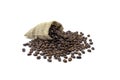 Roasted coffee beans and hemp bag. isolated on a white background. Royalty Free Stock Photo