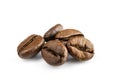 Roasted coffee beans isolated in white background cutout. Coffee background or texture concept. Royalty Free Stock Photo