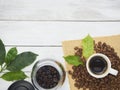 Roasted coffee beans with leaves Royalty Free Stock Photo