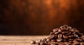 Roasted coffee beans on an orange background, side view