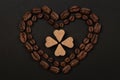 Roasted coffee beans placed in a shape of heart Royalty Free Stock Photo