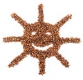 Roasted coffee beans placed in the shape of a smiling sun Royalty Free Stock Photo