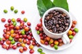 Roasted coffee beans and red ripe coffee beans