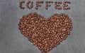 Roasted coffee beans in the shape of the heart Royalty Free Stock Photo