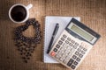 Roasted coffee beans in the shape of a heart and coffee cup, not Royalty Free Stock Photo