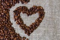 Roasted coffee beans in the shape of a heart Royalty Free Stock Photo