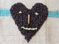 Roasted Coffee Beans in Shape of smiley heart Royalty Free Stock Photo