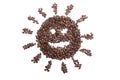 Roasted coffee beans in smile sun shape Royalty Free Stock Photo