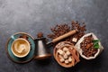 Roasted coffee beans, Turkish jezve, coffee cup and sugar Royalty Free Stock Photo