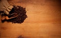 Roasted Coffee Beans On Wood Royalty Free Stock Photo