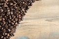 Coffee beans on wood background Royalty Free Stock Photo