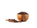 Roasted coffee beans in wooden bowl and scoop isolated on a white background. Royalty Free Stock Photo