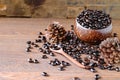 Roasted coffee beans in wooden cups