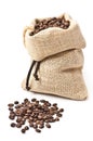 Roasted coffee beans with yuta bag Royalty Free Stock Photo