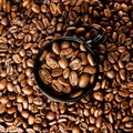 Roasted coffee in black cup Royalty Free Stock Photo