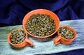Roasted coffeebeans in a ceramic bowl