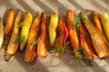 Roasted colorful carrots on baking sheet