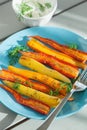 Roasted colorful carrots on plate