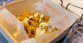 Roasted corn on the cob with ranch sauce. Take away food. Selective focus