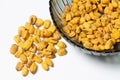 Roasted corn nuts in plate on white background Royalty Free Stock Photo