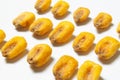 Roasted corn nuts on white background Royalty Free Stock Photo