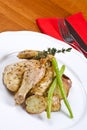 Roasted Cornish Game Hen Served and Potatoes Royalty Free Stock Photo