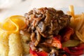 Roasted cutlet of veal with mushrooms and french f