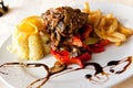 Roasted cutlet of veal with mushrooms and french f