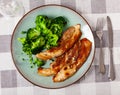 Roasted delicious pork belly with garnished of fresh broccoli Royalty Free Stock Photo