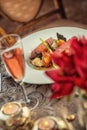 Roasted duck breast with cabbage and pancake served on white plate with glass of wine, winter and seasonal food, product photograp Royalty Free Stock Photo