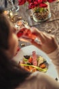 Roasted duck breast with cabbage and pancake served on white plate with glass of wine, winter and seasonal food, product photograp Royalty Free Stock Photo