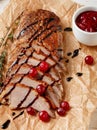 Roasted duck breast with thyme, cranberries and balsamic vinegar Royalty Free Stock Photo
