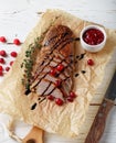Roasted duck breast with thyme, cranberries and balsamic vinegar Royalty Free Stock Photo