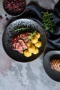 Duck breasts with Pommes Duchesse, cranberry sauce and pistachios Royalty Free Stock Photo