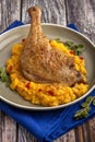 Roasted duck leg with pumpkin puree Royalty Free Stock Photo